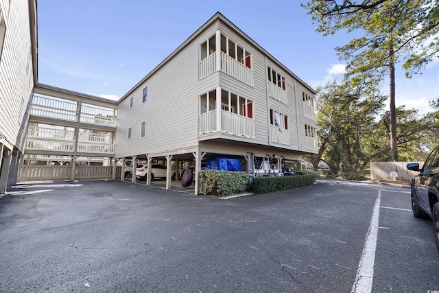 view of building exterior with a carport