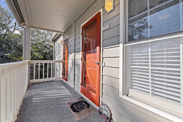 entrance to property with a porch