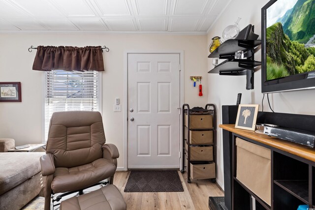 office with light hardwood / wood-style flooring