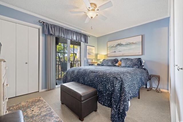 carpeted bedroom featuring a textured ceiling, ceiling fan, access to exterior, and ornamental molding