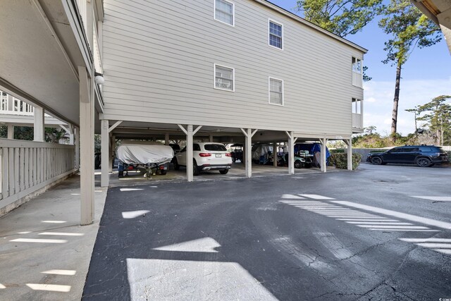 exterior space with a carport