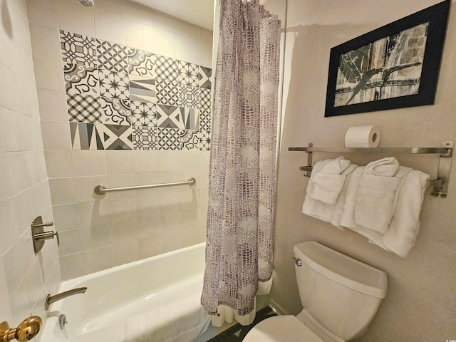 bathroom with shower / bath combo and toilet