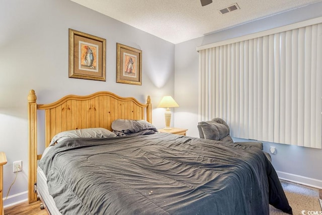 bedroom featuring a textured ceiling