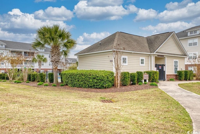 exterior space with a front lawn