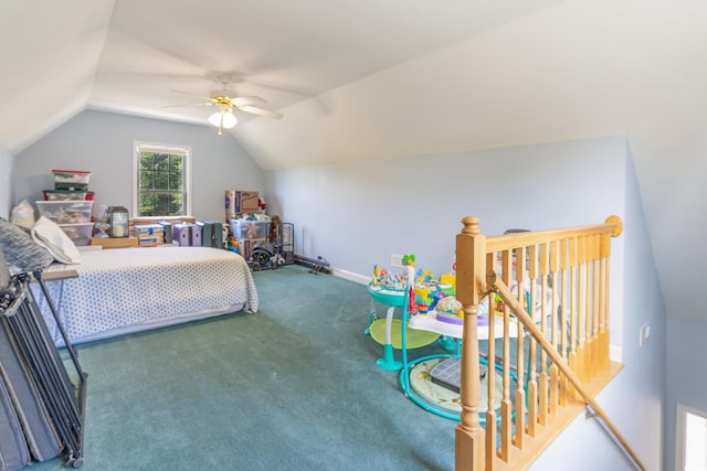 carpeted bedroom with vaulted ceiling, baseboards, and ceiling fan