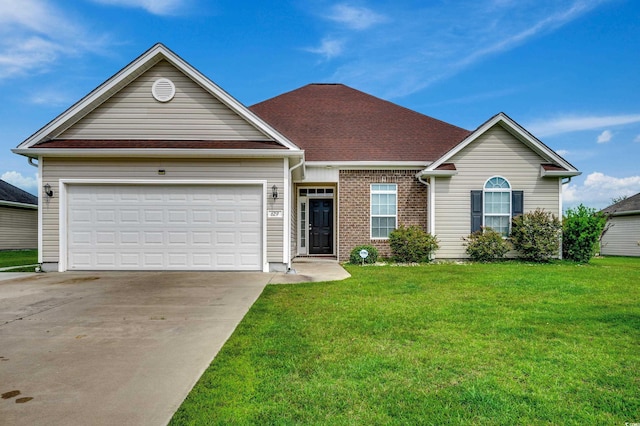 single story home featuring a front yard and a garage