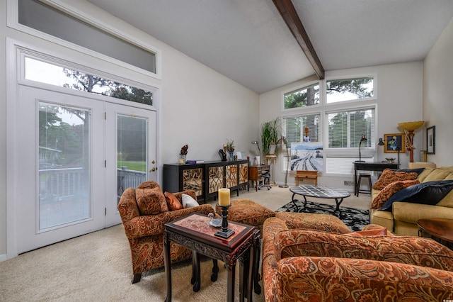 carpeted living room with lofted ceiling with beams