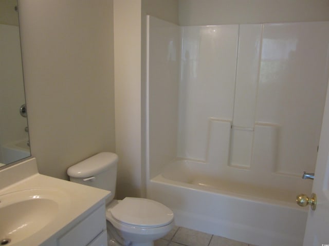 full bathroom featuring tile patterned flooring, vanity, toilet, and bathing tub / shower combination