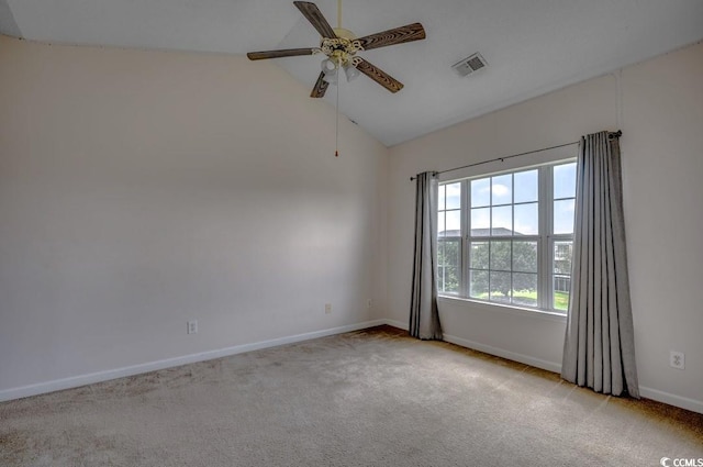 unfurnished room with light carpet, baseboards, visible vents, and a ceiling fan