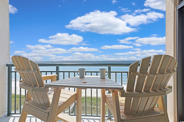 balcony featuring a water view