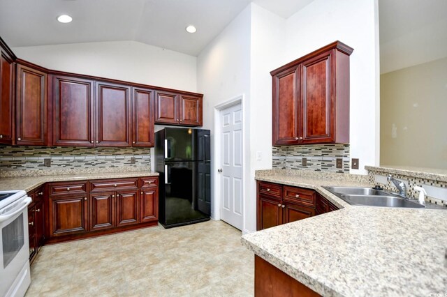 kitchen featuring tasteful backsplash, light tile patterned floors, sink, white electric range oven, and black fridge