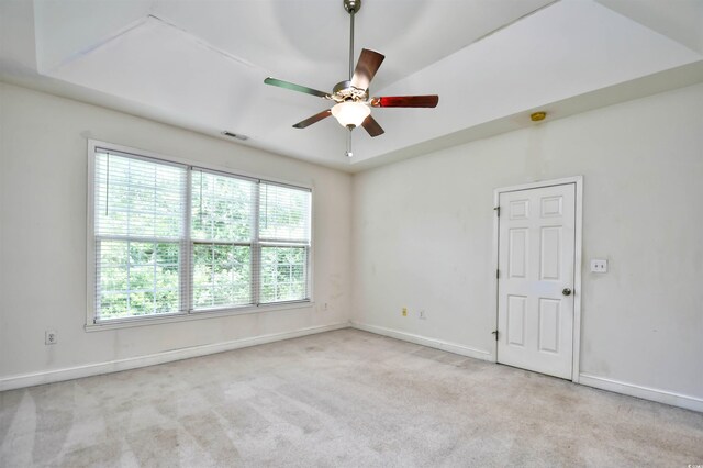 carpeted empty room with ceiling fan