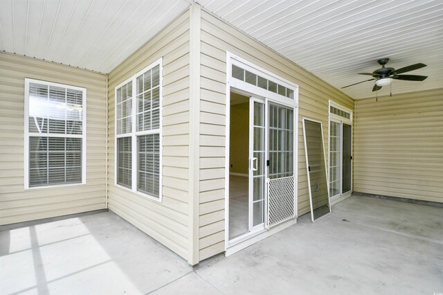 view of patio / terrace featuring ceiling fan