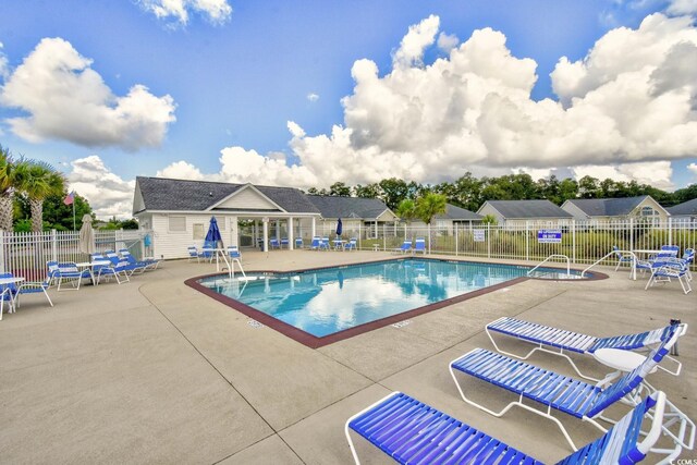 view of pool featuring a patio