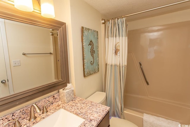 full bathroom featuring vanity, toilet, shower / tub combo, and a textured ceiling