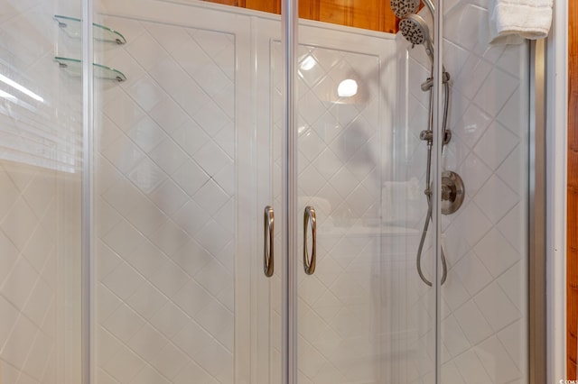 bathroom featuring an enclosed shower