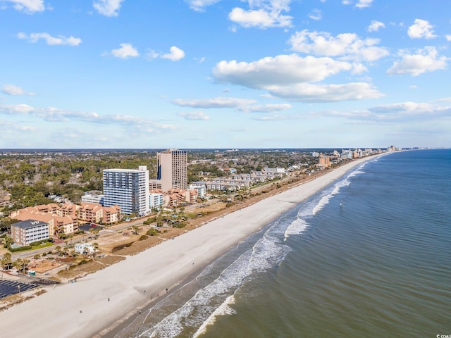 drone / aerial view with a view of the beach and a water view