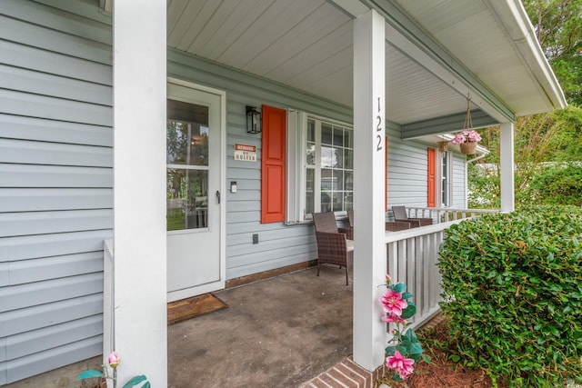 entrance to property with covered porch