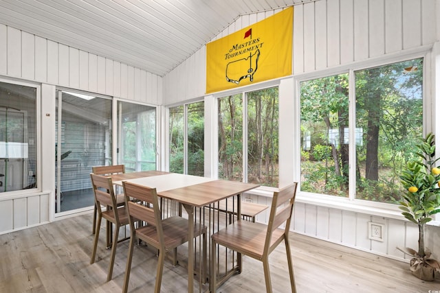 sunroom with vaulted ceiling and wooden ceiling