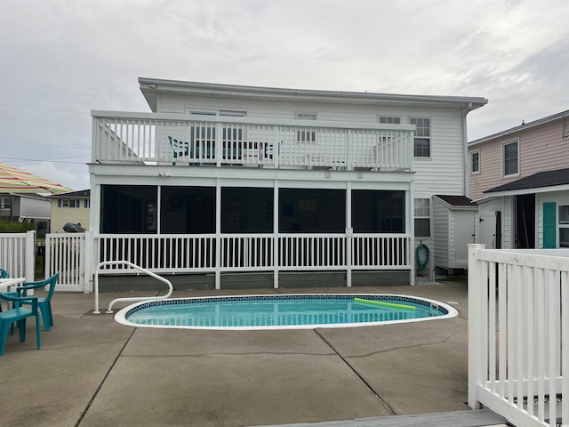 rear view of property with a patio