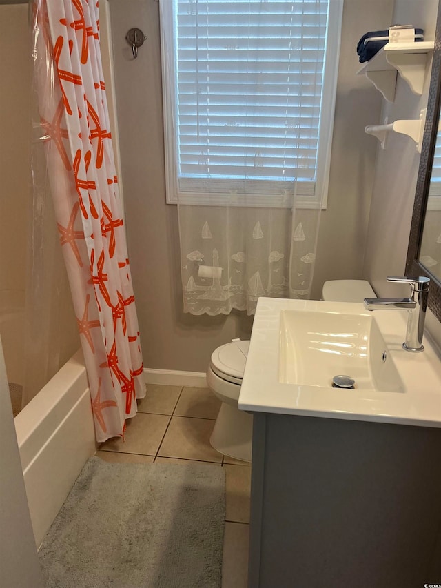 full bathroom featuring vanity, tile patterned flooring, toilet, and shower / tub combo with curtain