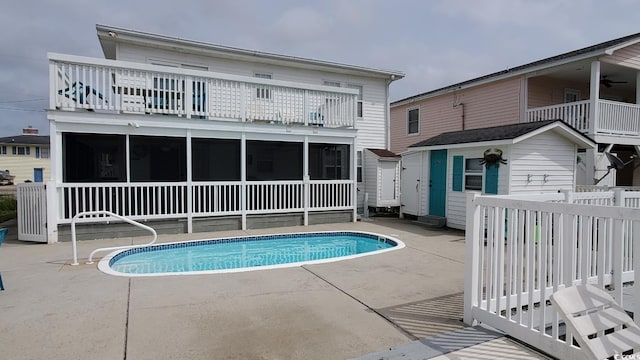 view of pool featuring a patio area