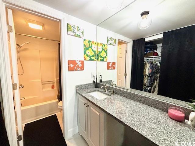 6850 Blue Heron Blvd Unit 106, Myrtle Beach, SC 29588 - full bathroom featuring vanity, toilet, and shower / tub combo