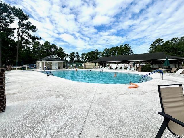 6850 Blue Heron Blvd Unit 106, Myrtle Beach, SC 29588 - view of swimming pool featuring a community hot tub