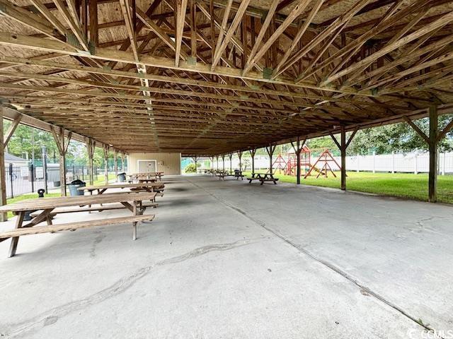 exterior space with concrete flooring