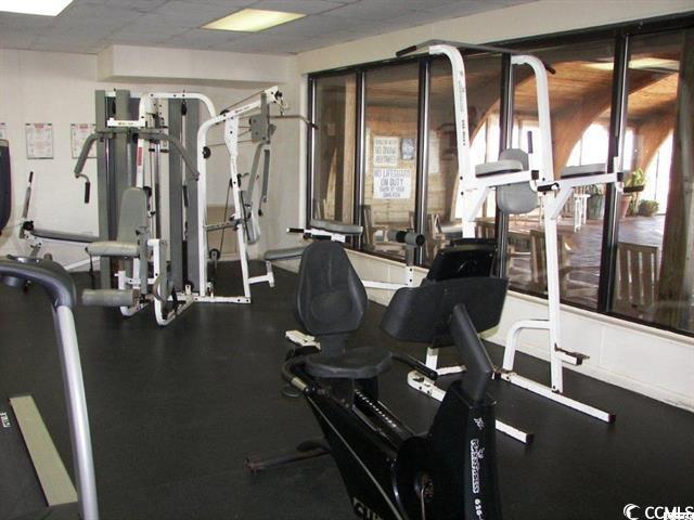 gym with a drop ceiling