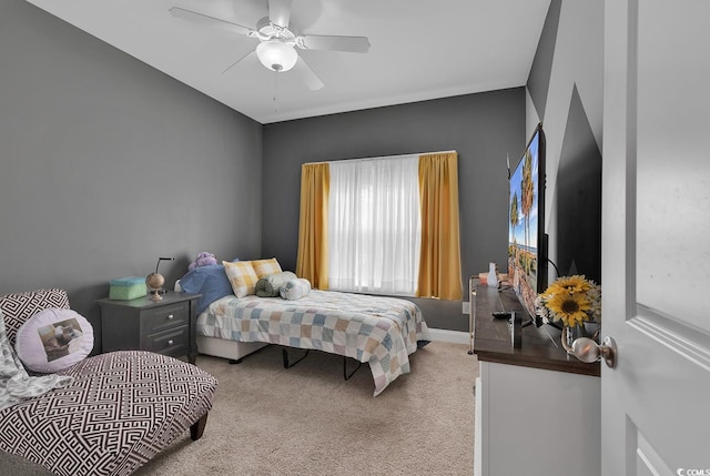 carpeted bedroom featuring a ceiling fan