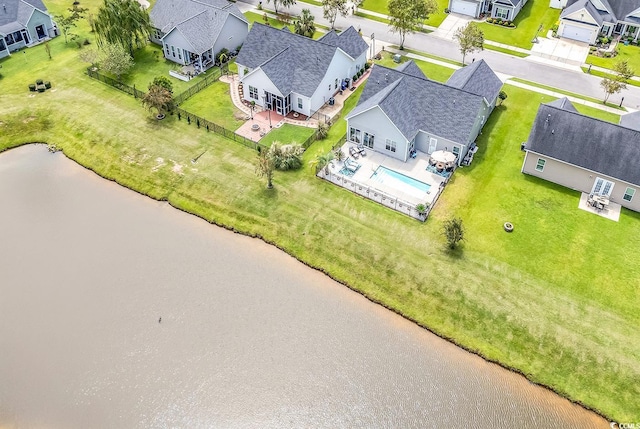 aerial view with a residential view and a water view