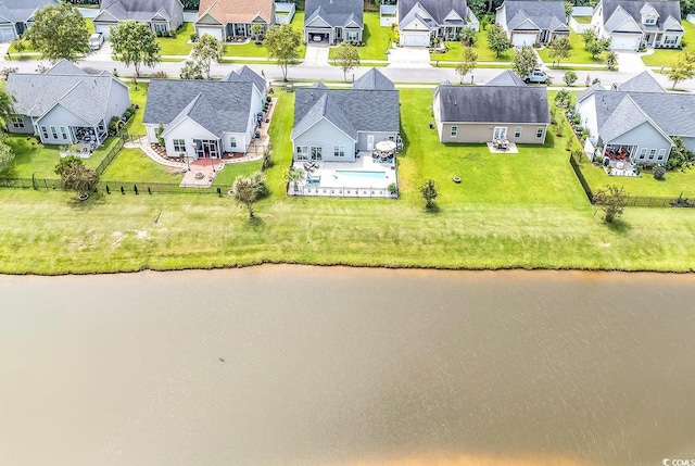 aerial view featuring a water view and a residential view