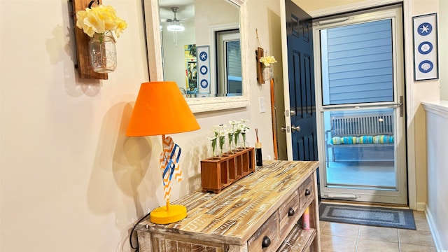 interior space featuring light tile patterned floors