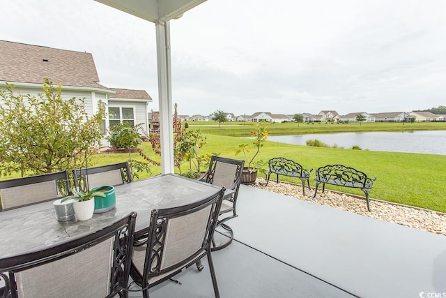 view of patio / terrace featuring a water view