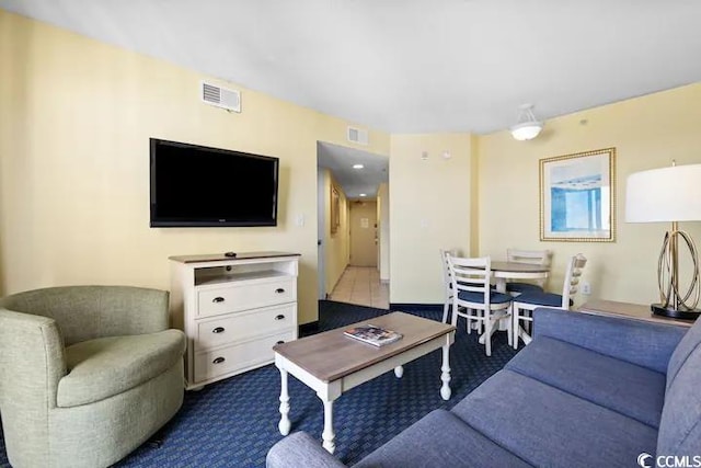 7100 Ocean Blvd N Unit 925, Myrtle Beach, SC 29572 - living room with dark colored carpet