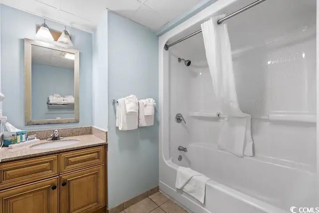 7100 Ocean Blvd N Unit 925, Myrtle Beach, SC 29572 - full bath with tile patterned floors, shower / bath combo with shower curtain, and vanity