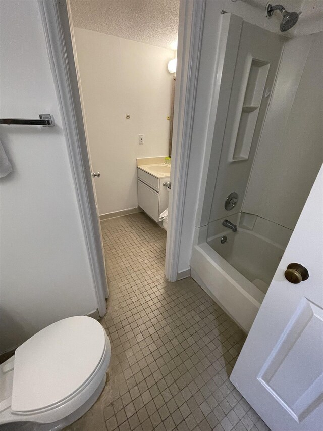 full bathroom with toilet, vanity, shower / tub combination, and tile patterned floors