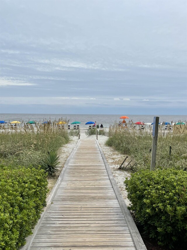 view of property's community featuring a water view