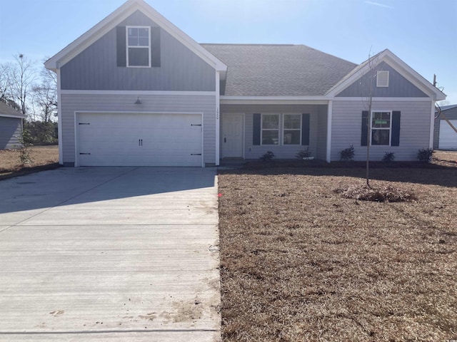 view of front of property featuring a garage