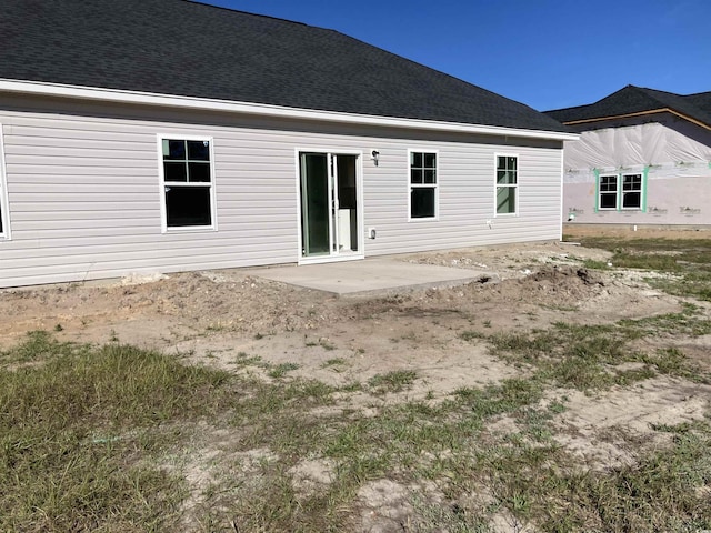 rear view of house featuring a patio