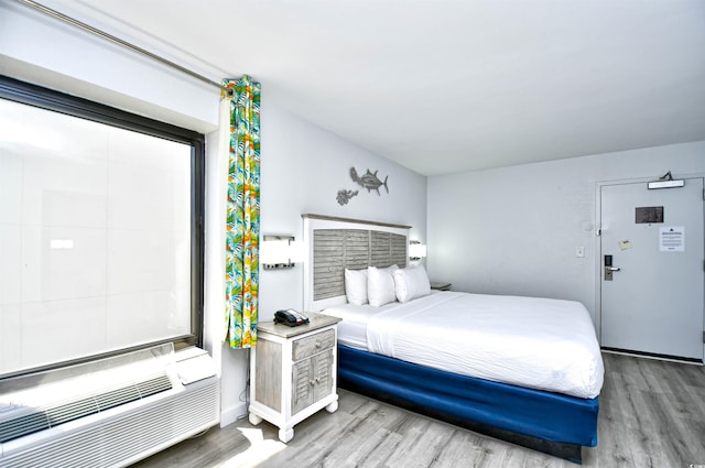 bedroom featuring light hardwood / wood-style floors