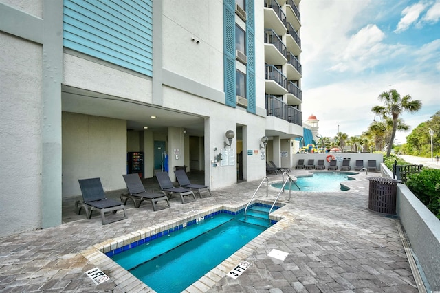 view of pool with a patio