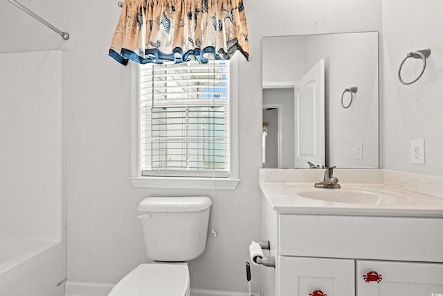 full bathroom with shower / bathtub combination, vanity, and toilet