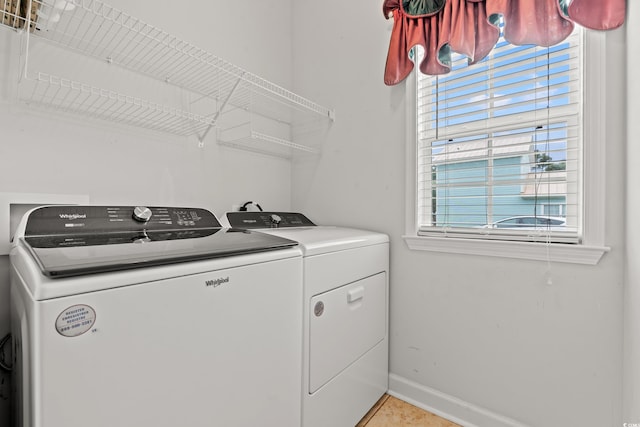 washroom featuring independent washer and dryer