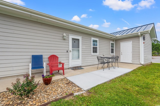 rear view of house featuring a patio