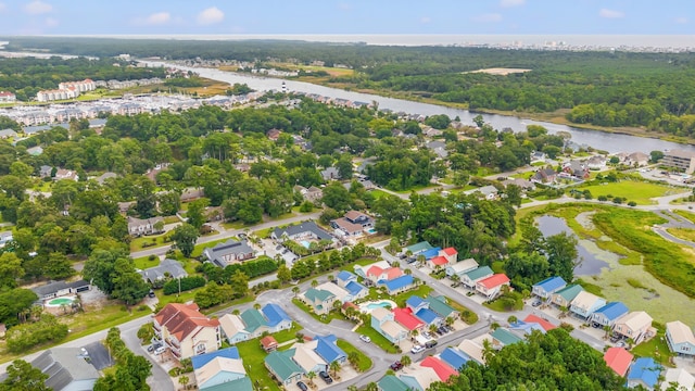 drone / aerial view with a water view