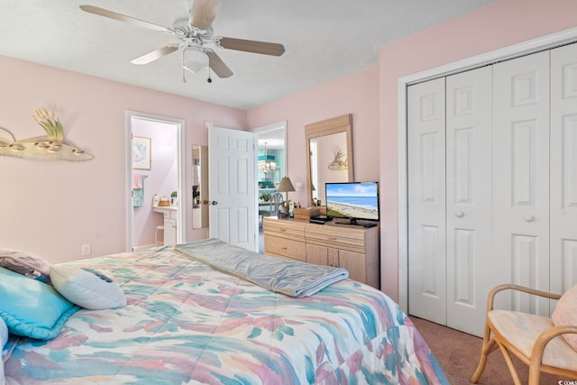 bedroom featuring ceiling fan, a closet, and carpet flooring