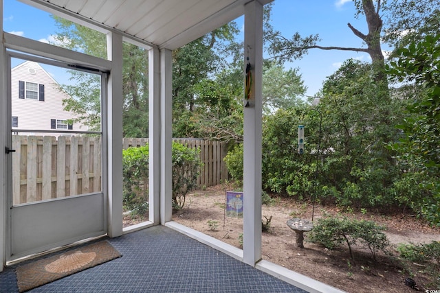 unfurnished sunroom with a healthy amount of sunlight