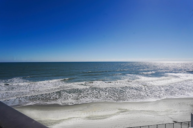 property view of water featuring a beach view